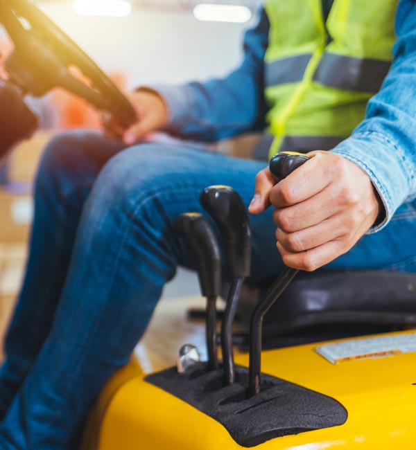 man using heavy machinery