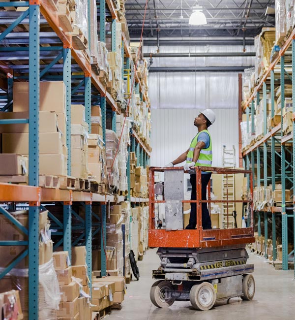 man using scissor lift